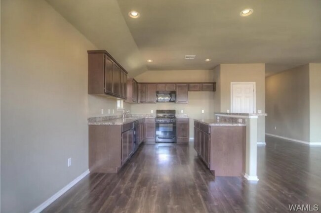Building Photo - Stylish 4BR/2BA Home with Garage & Privacy...