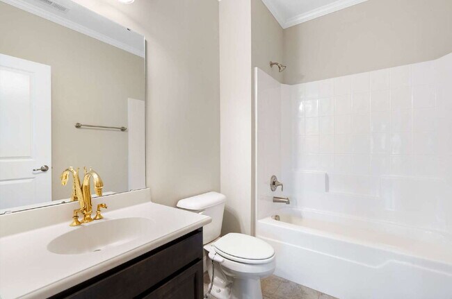 Building Photo - Luxurious 4-Bedroom Retreat with Third Floor Bonus Room & Fenced-in Backyard