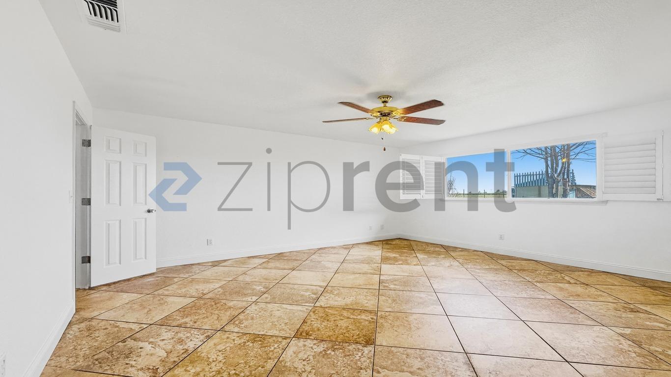 Building Photo - 8730 S East Ave