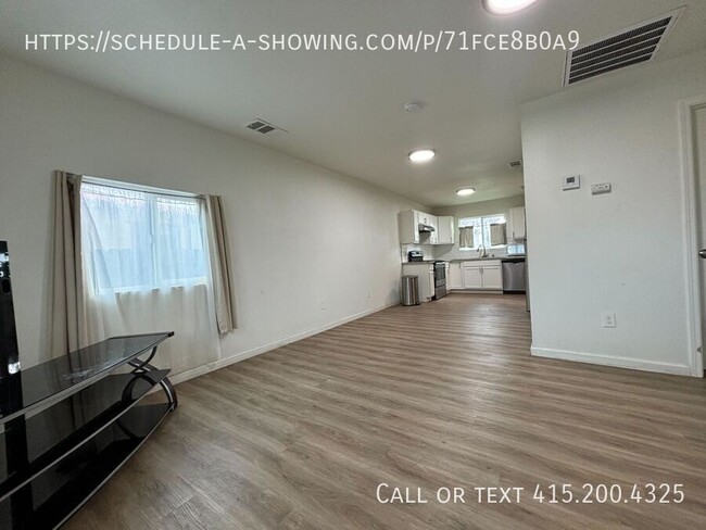 Building Photo - Stunningly Renovated Home with Modern Upgr...