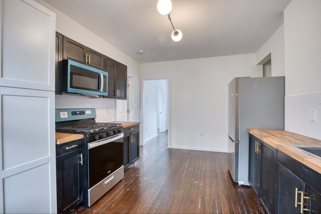Building Photo - 49-51 Kibbe St - Unit 202