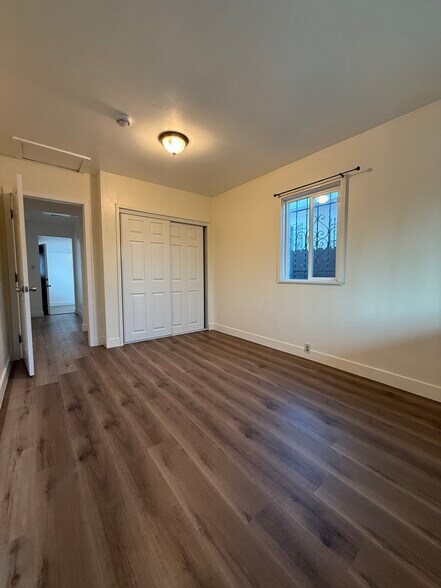 Bedroom with view of closet - 1437 W 60th Pl