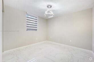 Building Photo - 3 bedroom in Hialeah gardens FL 33016