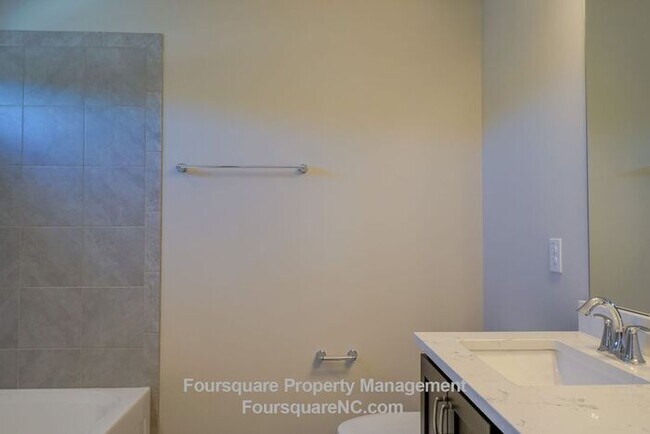 Building Photo - Modern 3-Story Townhome with Entry-Level Bonus Room, Back Deck & Garage , Community Pool in North...