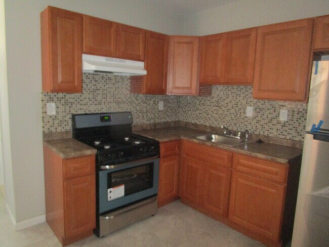 Building Photo - 6253 Magnolia St