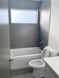 Building Photo - The Grey House – Cozy & Convenient Living ...