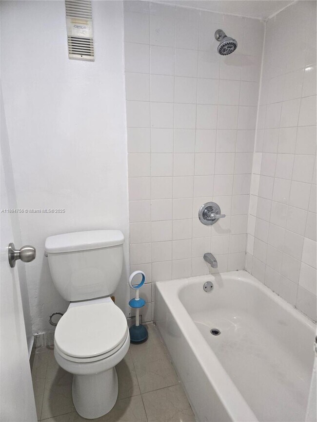 Building Photo - 4675 W 18th Ct