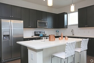 Building Photo - Move In & Save Big – Up to $1,000 Off