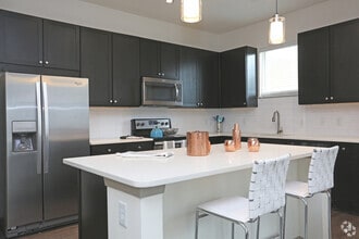 Building Photo - Move In & Save Big – Up to $1,000 Off