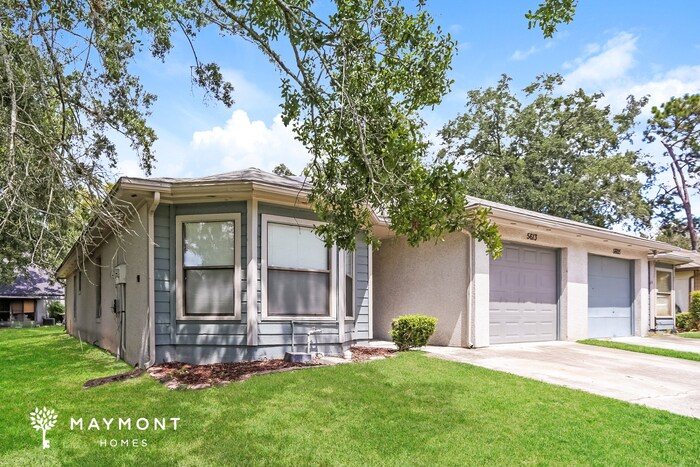 Building Photo - 5613 Pinebay Cir N