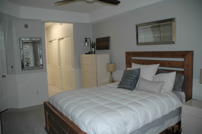 Master closet hall. Closets on both sides of hall - 7520 Edinborough Way