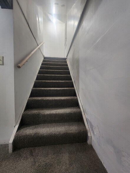 Basement stairway - 209 West Ave S