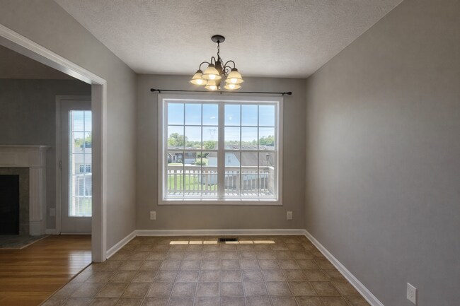 Building Photo - Stunning Split-Level Home with Space, Style & Scenic Views