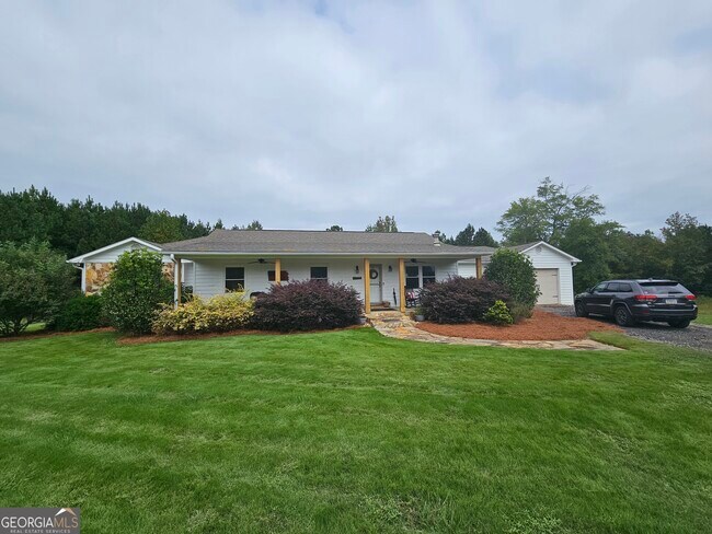 Building Photo - 6090 Strickland Town Rd