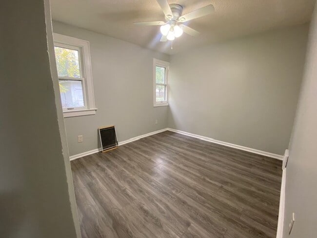 Building Photo - Updated 5-Bed, 2-Bath with Attic Suite & C...