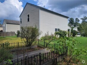 Building Photo - 7214 Vaden Dr