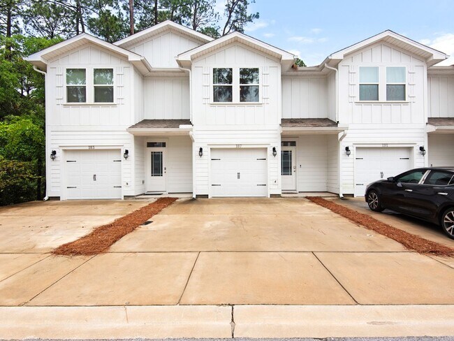 Building Photo - Brand New Furnished Townhome located just ...