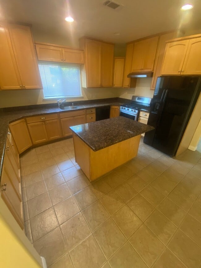 Building Photo - Advent - Three Bedroom House W/ Two Car Ga...