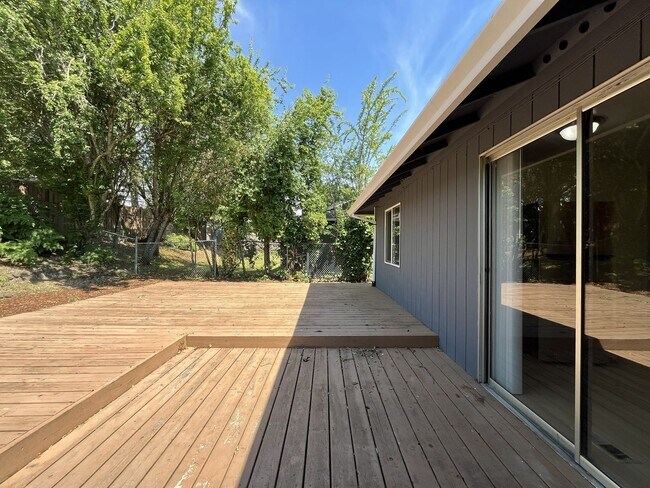 Building Photo - Charming Ranch Home with Sunroom or 4th Bedroom, Two-Car Garage and Fenced Backyard