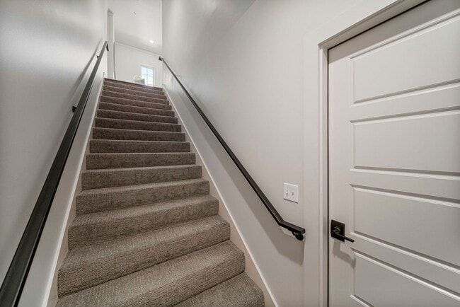 Building Photo - Discover modern elegance in the newly constructed Edgewater Condominiums, a boutique community fe...