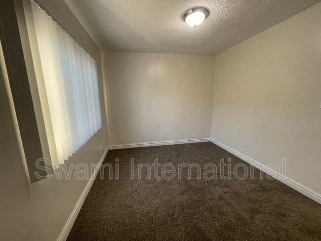 Building Photo - 10970 S Figueroa St