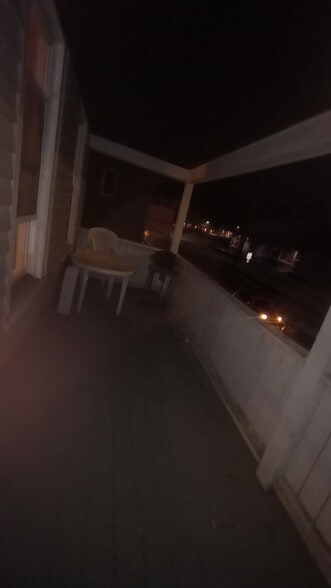 Walk out on porch - 203 W Main St