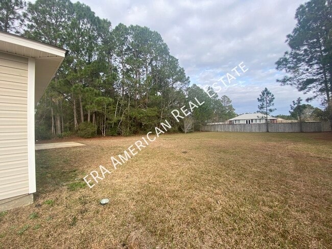 Building Photo - 7418 Woodmont Rd