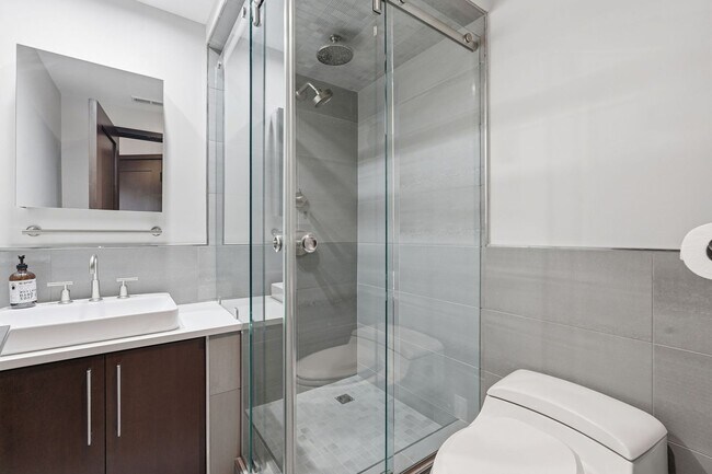 Building Photo - This exceptional West Market location is just steps from Reston Town Center, offering convenient ...