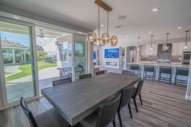Building Photo - Spectacular 5-Bedroom Home with Pool, RV P...