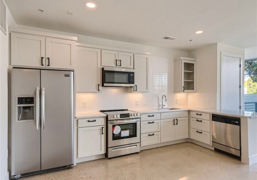 All stainless steel appliances. - 2906 S 1st St