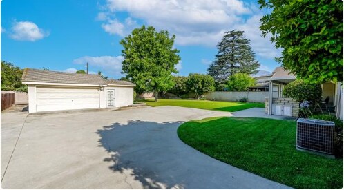 A 2-car garage that includes plenty of storage space - 1419 S 4th Ave