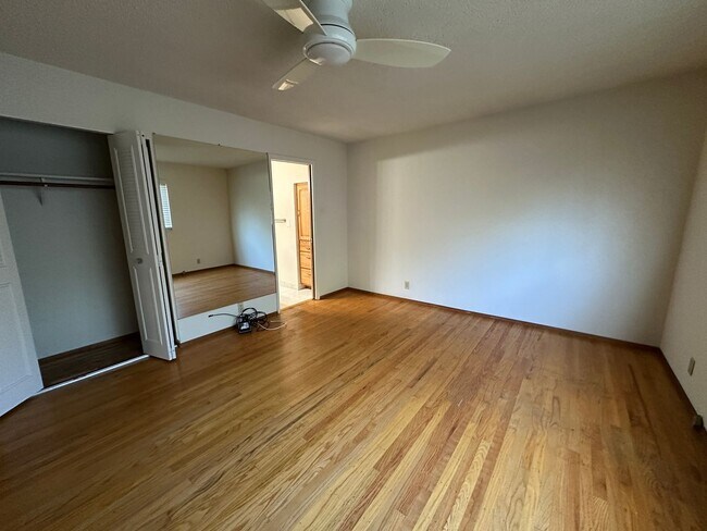 Building Photo - 4 Bedroom, bedrooms with hardwood floors