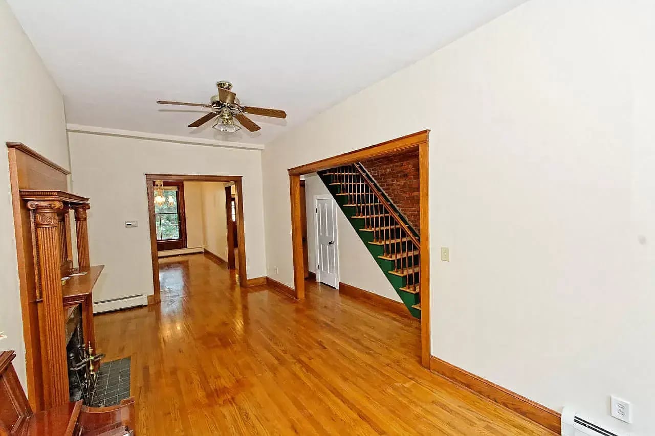 living room, use your imagination and fill the space. (sweet brick wall though, right?) - 342 Hudson Ave