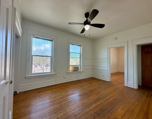 Building Photo - Charming Second Floor Unit with Off-Street Parking