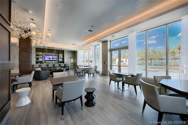 Building Photo - 10155 Collins Ave