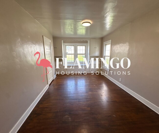 Building Photo - Charming 2 Bedroom, 1 Bath Home – Refinished Hardwood Floors, Detached Garage & More!