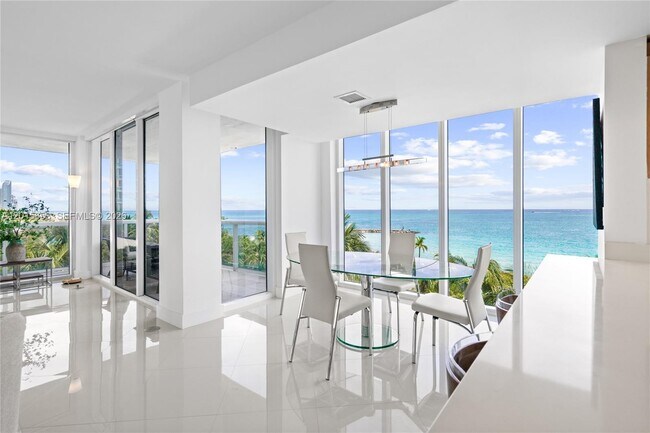 Building Photo - 10275 Collins Ave