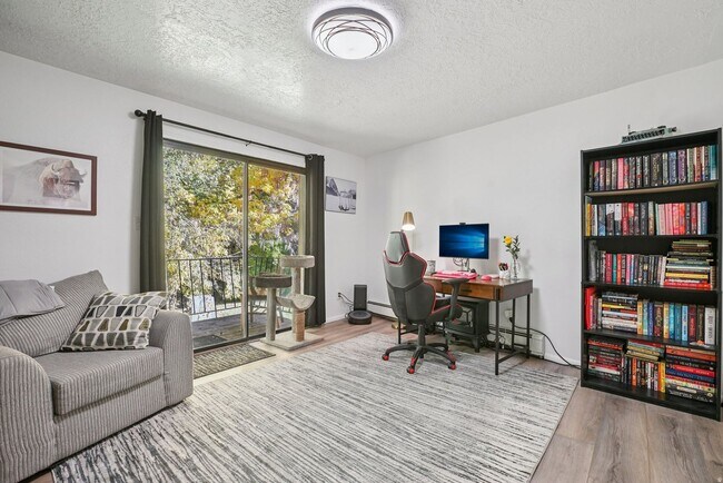 Building Photo - Springville Condo with Updated Kitchen, Deck & Creekside Setting