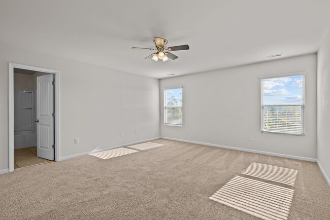 Building Photo - Spacious 5 Bedroom Home with 2-Car Garage,...