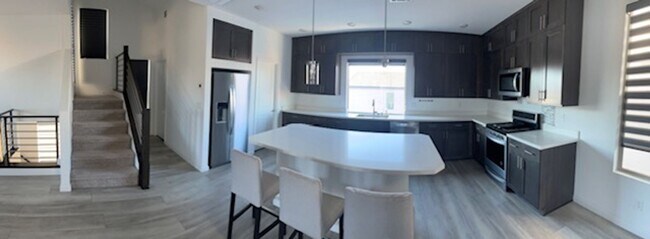 Building Photo - Stylish 3-Story Home with Rooftop Deck & B...