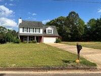 Building Photo - Ola schools 4 bedrooms 2.5 baths on large level lot