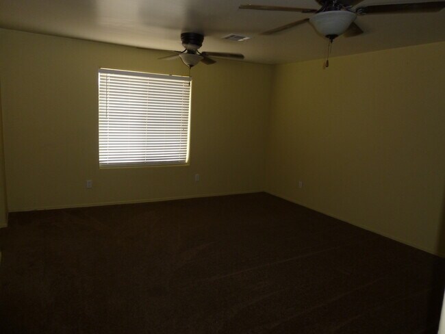 Building Photo - 4  BED, HUGE BACKYARD, 3 CAR GARAGE!