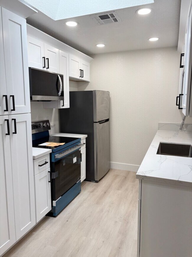 Building Photo - **BRAND NEW!! FULLY RENOVATED CONDO IN CHANDLER (CHANDLER BLVD & COOPER)**