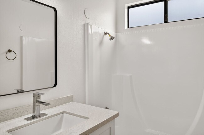 Building Photo - Fully Renovated 2 Bed, 2 Bath Home with Central A/C, Detached Garage & Brand-New Appliances.