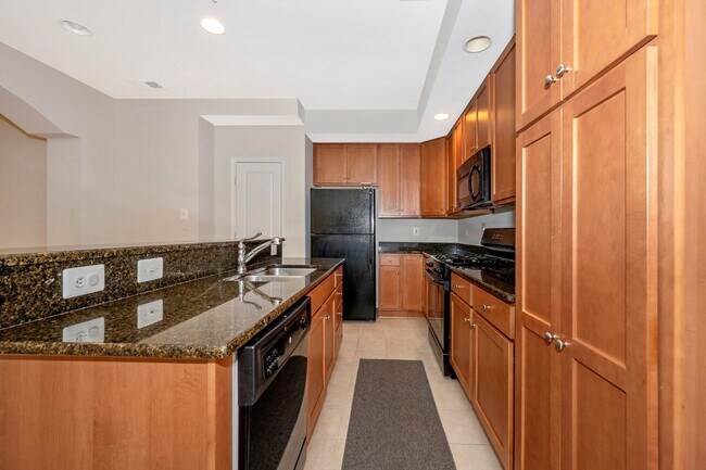 Building Photo - Desirable Two Level Condo For Lease - Not Pet Friendly