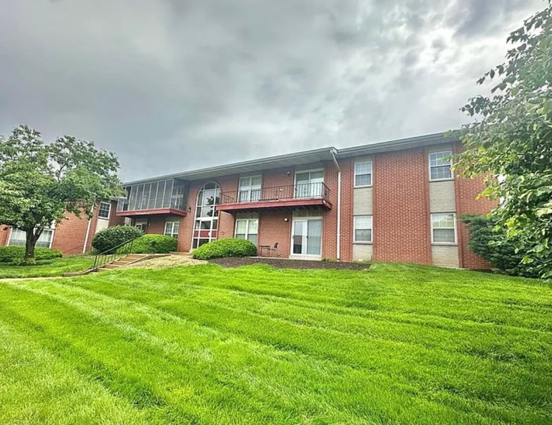 Building with front door secured - 10341 Forest Brook Ln