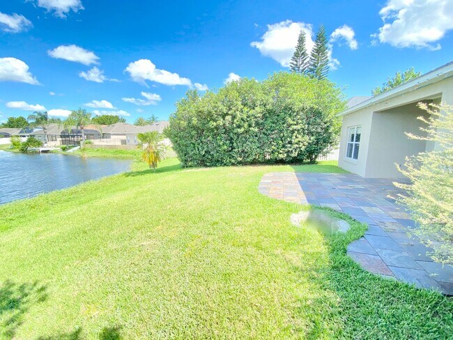 Building Photo - Stunning Lake View Home in Waterside Estate!
