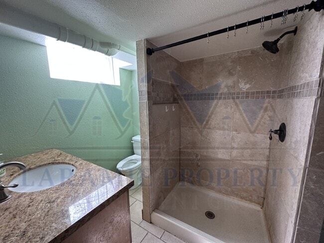 Building Photo - One-Bedroom Basement Apartment on Grand
