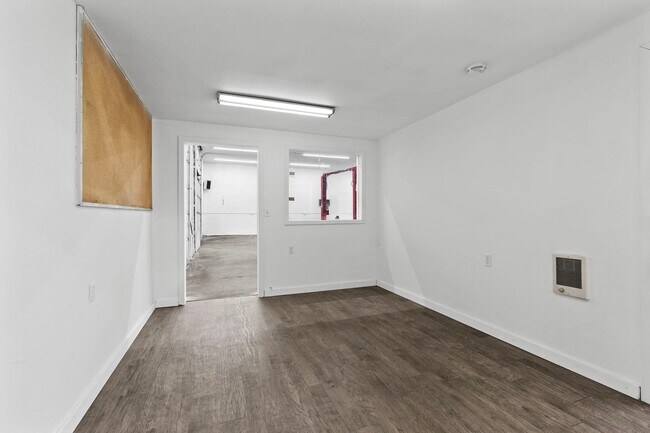 Building Photo - Stunning Home and Three Bay Shop Along Spo...