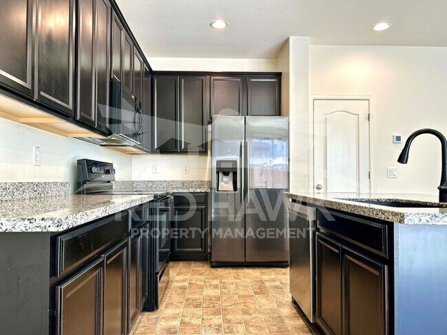 Building Photo - 9728 E Axle Ave